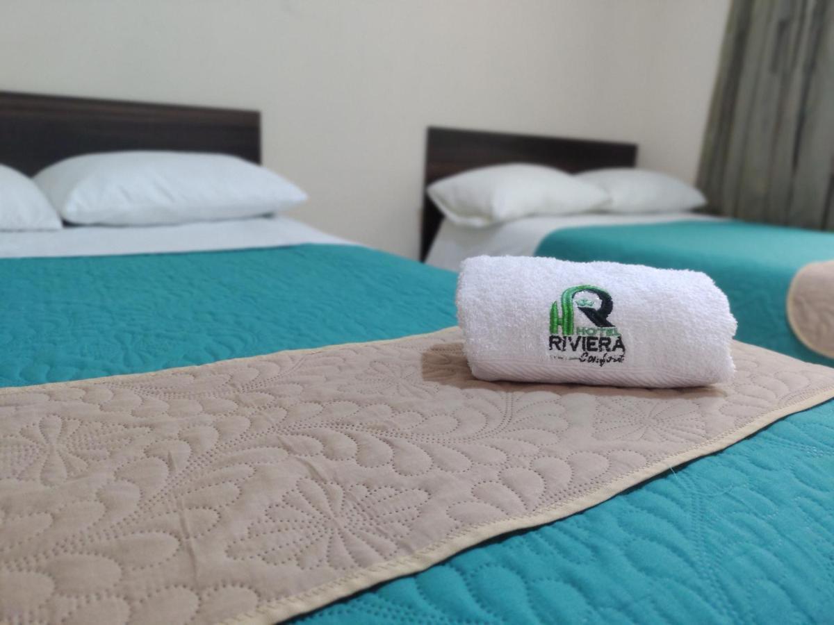 Hotel Riviera Confort Pasto Bagian luar foto