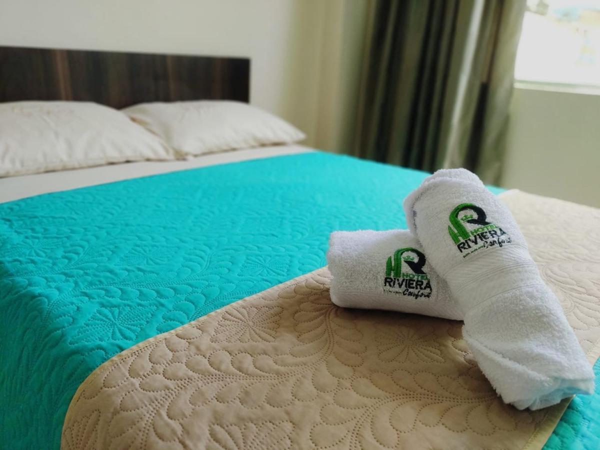 Hotel Riviera Confort Pasto Bagian luar foto