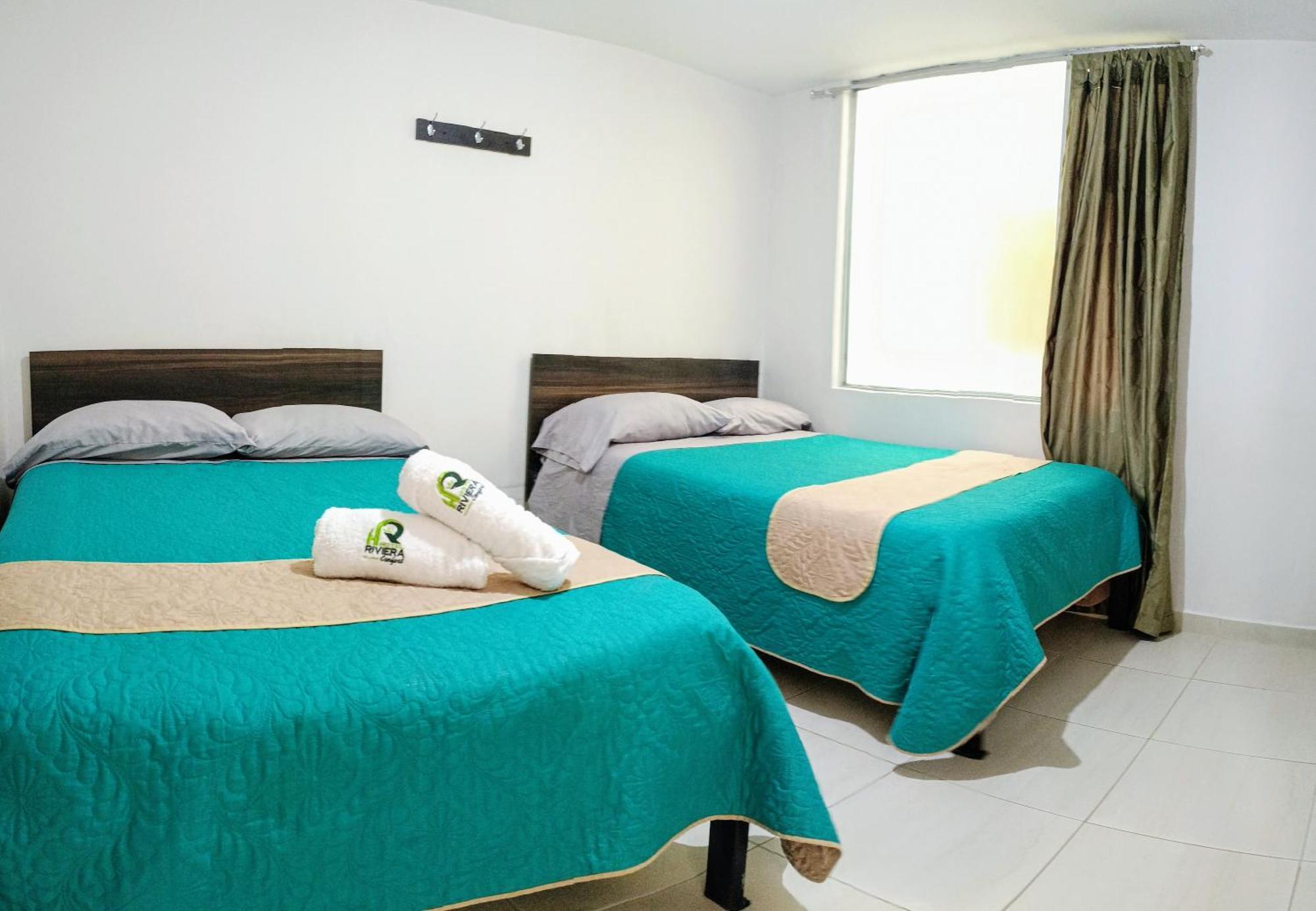 Hotel Riviera Confort Pasto Bagian luar foto
