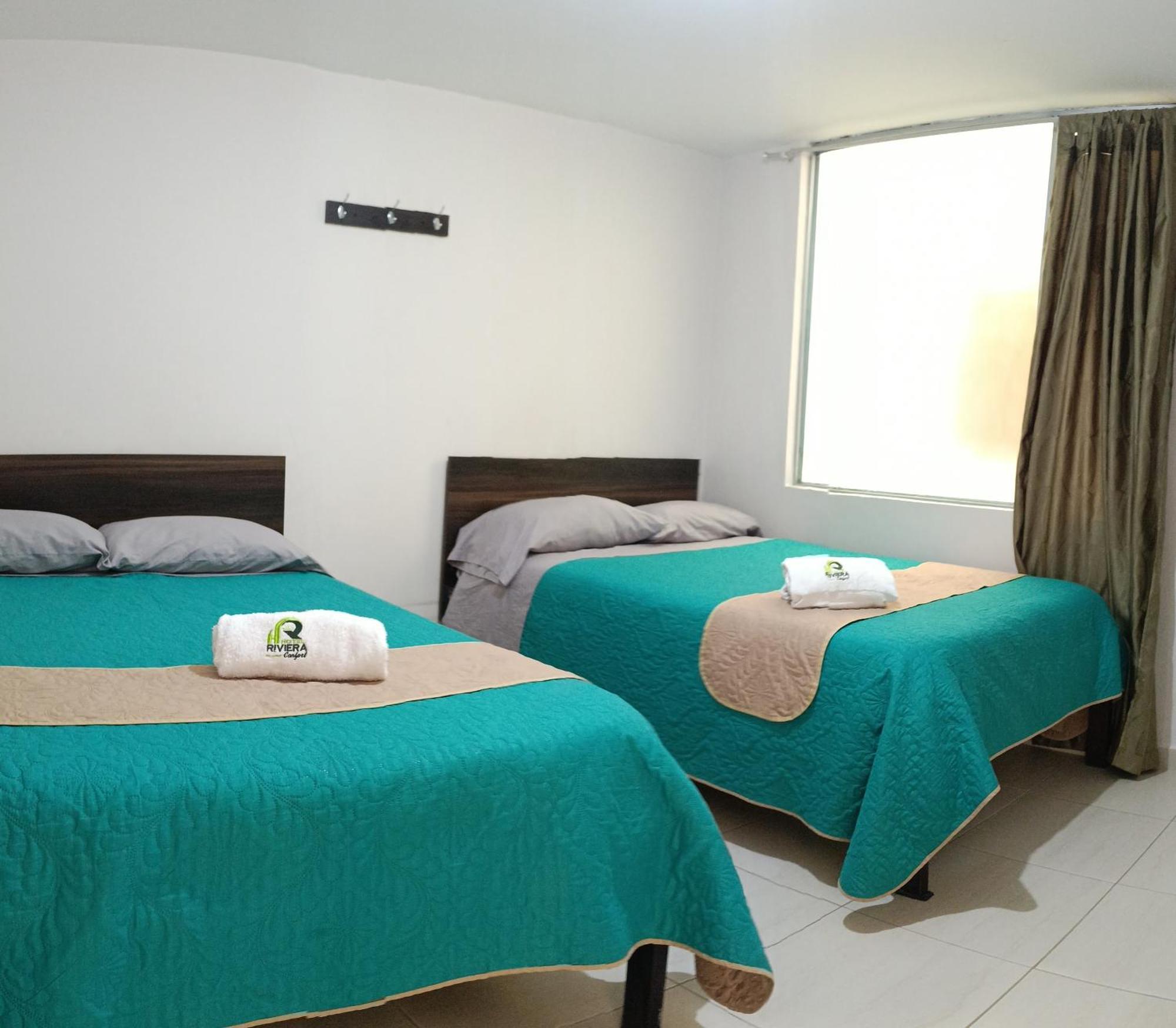 Hotel Riviera Confort Pasto Bagian luar foto